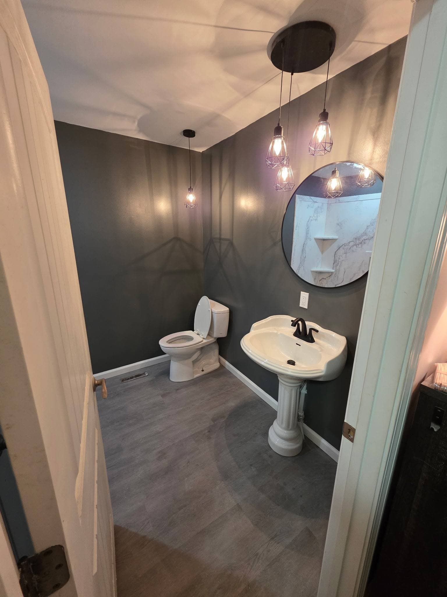 Dark Bath with Cage Pendants